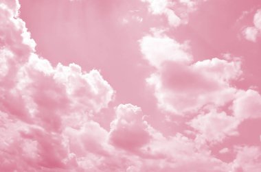 Arkaplan kullanımı için açık mavi gökyüzü ve beyaz bulutların görüntüsü Viva Magenta tonlarında, 2023 yılının rengi