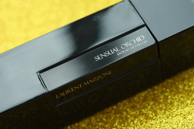 KYIV, UKRAINE - MAY 4, 2022 Bottle of Laurent Mazzone Sensual Orchid premium luxury perfume on bright background