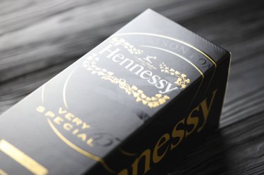 KYIV, UKRAINE - MAY 4, 2022 Hennessy Very Special original alcohol bottle on black wooden table. Elite alcohol production