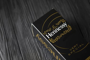 KYIV, UKRAINE - MAY 4, 2022 Hennessy Very Special original alcohol bottle on black wooden table. Elite alcohol production