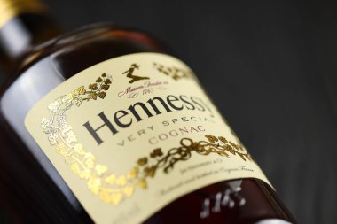 KYIV, UKRAINE - MAY 4, 2022 Hennessy Very Special original alcohol bottle on black wooden table. Elite alcohol production