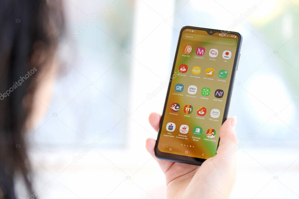 TERNOPIL, UKRAINE - AUGUST 3, 2023 Banking applications on screen of display on modern smartphone. Official apps of famous polish banks