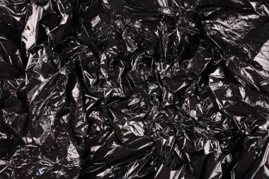 Siyah plastik çöp poşeti dokusu.