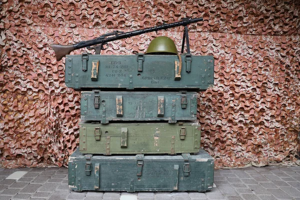 Soviet army ammunition stack of green crates with russian names of ammo type and category number