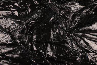 Siyah plastik çöp poşeti dokusu.