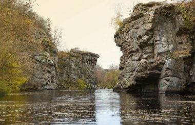 Granite rocks of Bukski Canyon with the Girskyi Tikych River. Picturesque landscape and beautiful place of ukrainian tourism