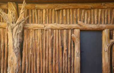 Brown wood texture background coming from natural tree. The wooden panel has a beautiful dark pattern, fence texture in daytime