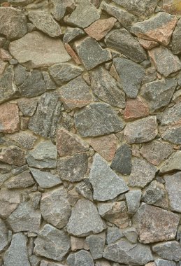 Birçok concreted taş çeşitli şekiller güçlü bir taş duvar dokusu