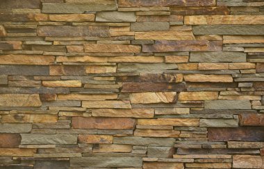 Farklı boyut ve sesleri uzun ve sert taş taş duvardan dokusuna