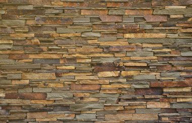 Farklı boyut ve sesleri uzun ve sert taş taş duvardan dokusuna