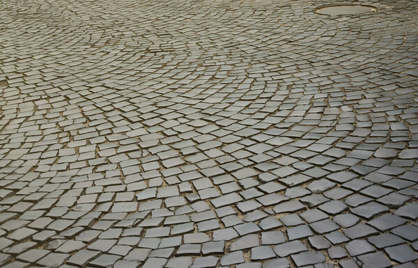 A large area, covered with a quality paving stone in daylight