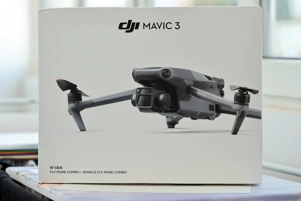 stock image KYIV, UKRAINE - 4 MAY, 2023: new DJI Mavic 3 fly more combo quadrocopter drone on light background