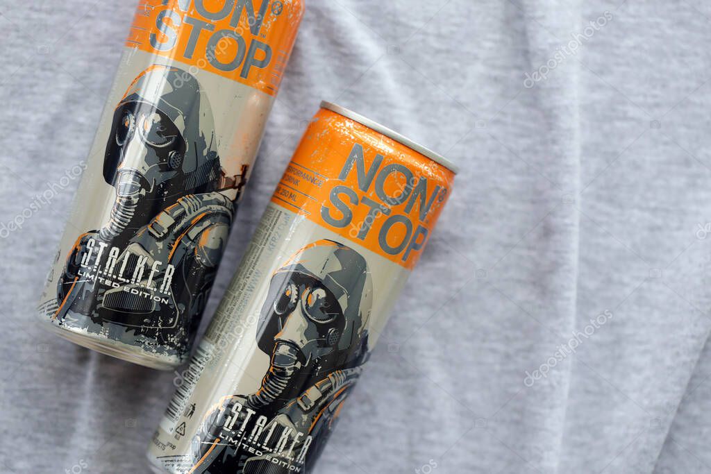KYIV, UKRAINE - OCTOBER 31, 2023 Non Stop energy drink with limited edition design of Stalker and character with gas mask on aluminium tin can close up