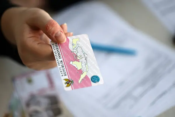Indonesia child identity card Kartu Identitas Anak or KIA card. ID document for indonesian children close up