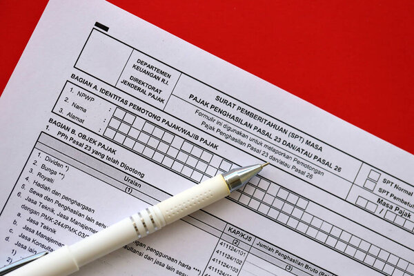 Индонезийская налоговая форма уведомления письмо SPT за период подоходного налога статья 23 и или статья 26 на таблице бухгалтера