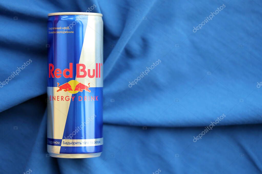 TERNOPIL, UKRAINE - JULY 7, 2023 Red Bull energy drink aluminium tin can with original design close up