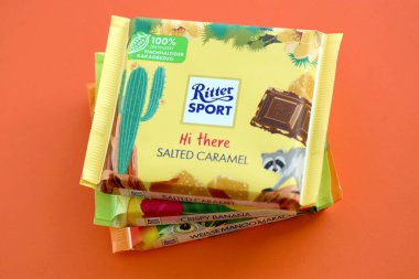 TERNOPIL, UKRAINE - JULY 7, 2023 Ritter Sport Chocolate square bars with exotic taste close up clipart