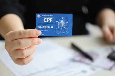 KYIV, UKRAINE - 31 Ekim 2023 Blue CPF kart şablonu. Belge, Brezilya 'daki insanlar arasındaki elektronik iletişimin gerçekliğini ve bütünlüğünü garanti ediyor. Kadastro de Pessoa Fisica
