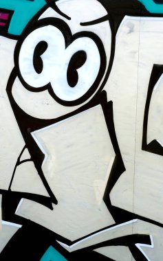 Duvarında parlak aerosol çizgileri olan grafiti resimlerinin renkli arka planı. Eski moda sokak sanatı sprey boya kutularından yapılmış. Çağdaş gençlik kültürü arka planı