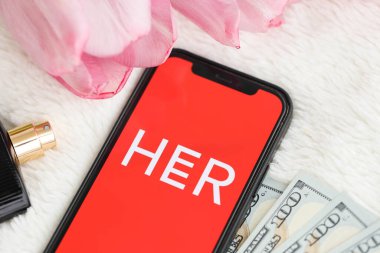 KYIV, UKRAINE - 23 Şubat 2024 Ünlü randevu sitesi logosu veya iPhone ekranındaki uygulaması