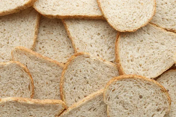 Tam kare makro fotoğraflı taze dilimlenmiş ekmek. Yakın çekim.