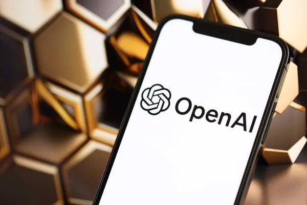 stock image KYIV, UKRAINE - MARCH 17, 2024 OpenAI logo on iPhone display screen with background of artificial intelligence futuristic ai generated image close up