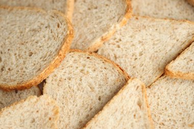 Tam kare makro fotoğraflı taze dilimlenmiş ekmek. Yakın çekim.
