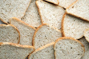 Tam kare makro fotoğraflı taze dilimlenmiş ekmek. Yakın çekim.