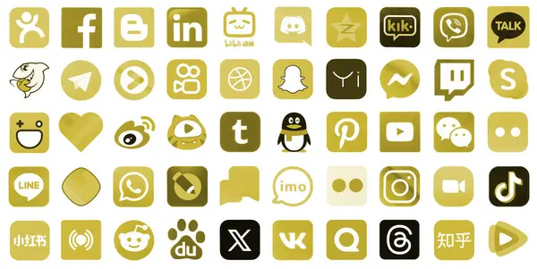 stock image KYIV, UKRAINE - APRIL 1, 2024 Many icons of popular social media, messengers, video sharing platforms and other smartphone services printed on white paper in yellow color