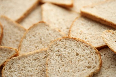 Tam kare makro fotoğraflı taze dilimlenmiş ekmek. Yakın çekim.