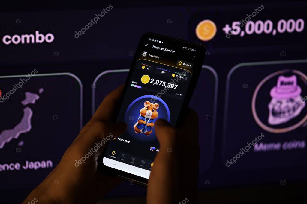 KYIV, UKRAINE - APRIL 20, 2024 Hamster Kombat telegram bot on smartphone screen. Hamster Kombat is a viral Telegram-based crypto game for earn HMSTR tokens by managing a virtual crypto exchange