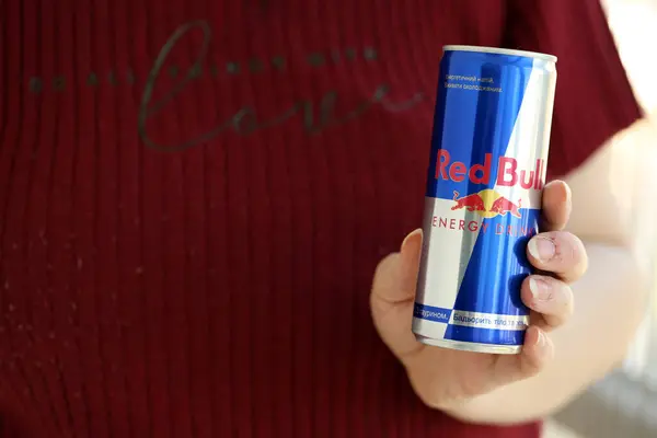 stock image KYIV, UKRAINE - APRIL 20, 2024 Red Bull original drink in aluminum tin can close up