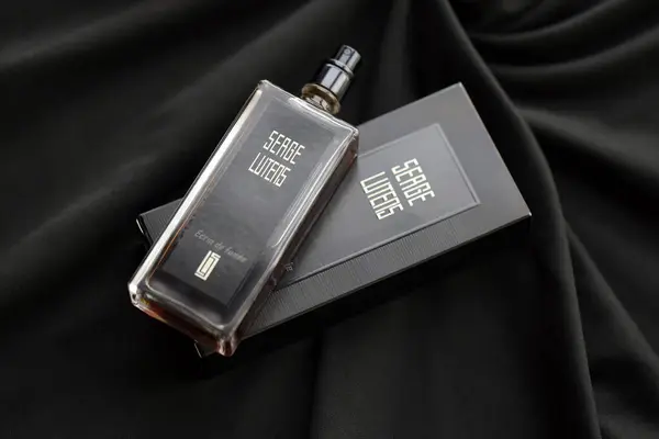 stock image KYIV, UKRAINE - APRIL 20, 2024 Bottle of Serge Lutens Ecrin de Fumee perfume. Serge Lutens is a French perfume creator, known principally for the fashion house fragrance company which bears his name