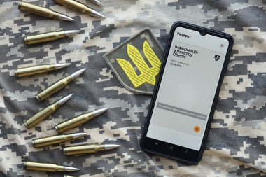 KYIV, UKRAINE - 20 Haziran 2024 Rezerv artı - Ukraynalı akıllı telefon uygulaması askerlerin askere alınması ve askerlerin askere alınması hakkında kişisel bilgilere sahip