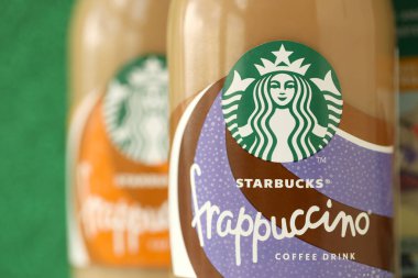 KYIV, UKRAINE - APRIL 20, 2024 Starbucks Frappuccino Coffee Drink. Seattle based Starbucks is the largest coffeehouse company in the world, with over 20,000 stores in 62 countries clipart