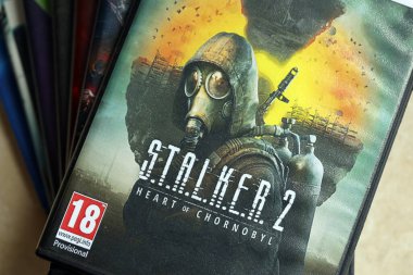 KYIV, UKRAINE - 26 Haziran 2024 Stalker 2 PS5 video oyun diski konsol oyunu için. Hayali hayran yapımı popüler video oyunu diski kapat