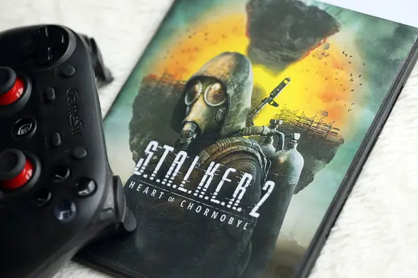 stock image KYIV, UKRAINE - JUNE 26, 2024 Stalker 2 PS5 video game disc box for console gaming. Fictional fan-made popular video game disc close up