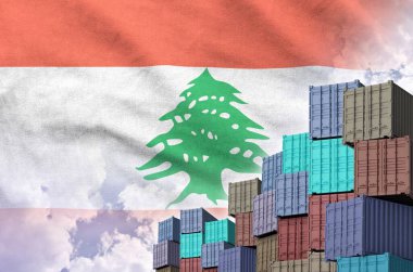 Lebanon flag and big stack of shipping cargo containers in docks with sky background close up clipart