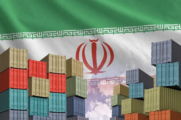 stock image Iran flag and big stack of shipping cargo containers in docks with sky background close up