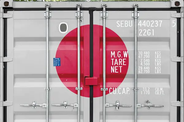 stock image Japan flag depicted on metal doors of shipping cargo container outdoors in docks area close up