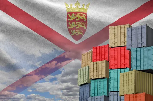 stock image Jersey flag and big stack of shipping cargo containers in docks with sky background close up