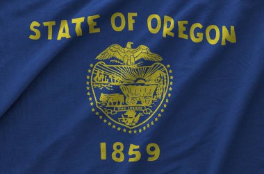 Oregon Amerikan bayrağı eski kumaştan katlanmış dalgalı kumaş üzerine çizilmiş.