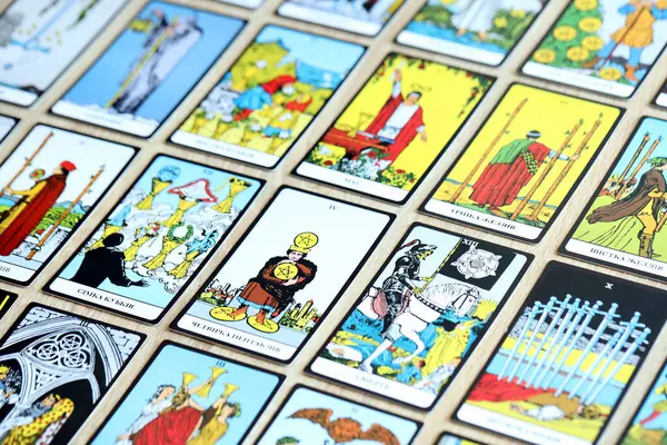 stock image KYIV, UKRAINE - JULY 10, 2024 Tarot minor and major arcana cards of Rider Waite esoteric deck. Many tarot cards for fortune telling and esoteric actions close up