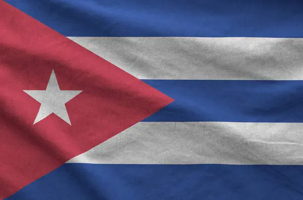 stock image Cuba flag depicted on folded wavy fabric of old cloth close up