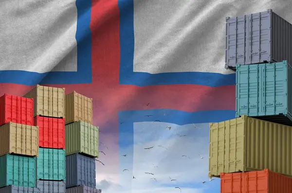 stock image Faroe islands flag and big stack of shipping cargo containers in docks with sky background close up