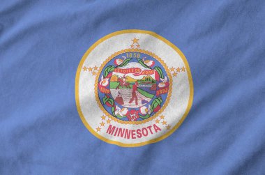Minnesota ABD bayrağı eski kumaşların katlanmış dalgalı kumaşında tasvir edilmiştir.