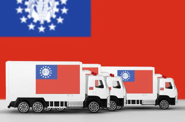 stock image Myanmar flag depicted on side wall of white delivery van close up. Shipping and local delivery concept