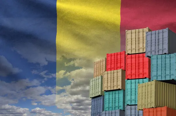 stock image Chad flag and big stack of shipping cargo containers in docks with sky background close up