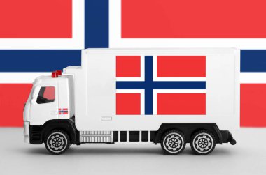 Norway flag depicted on side wall of white delivery van close up. Shipping and local delivery concept clipart