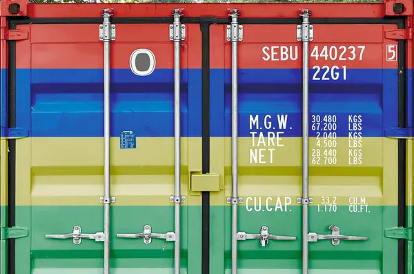 stock image Mauritius flag depicted on metal doors of shipping cargo container outdoors in docks area close up